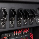 Toggle Switch Missile Cover Black installed and in use on dashboard switch panel