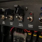 Toggle Switch Narva SPST 20A With Carbon Fibre Missile Switch Cover installed on dashboard panel