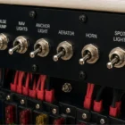 Cole Hersee 55014BX toggle switch installed on marine dashboard switch panel