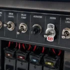 Narva Toggle Switch R13-5 SPST 20A 60060 installed on marine dashboard panel