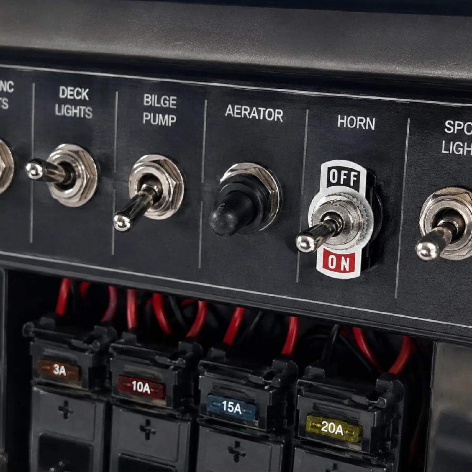 Narva Toggle Switch R13-5 SPST 20A 60060 installed on marine dashboard panel