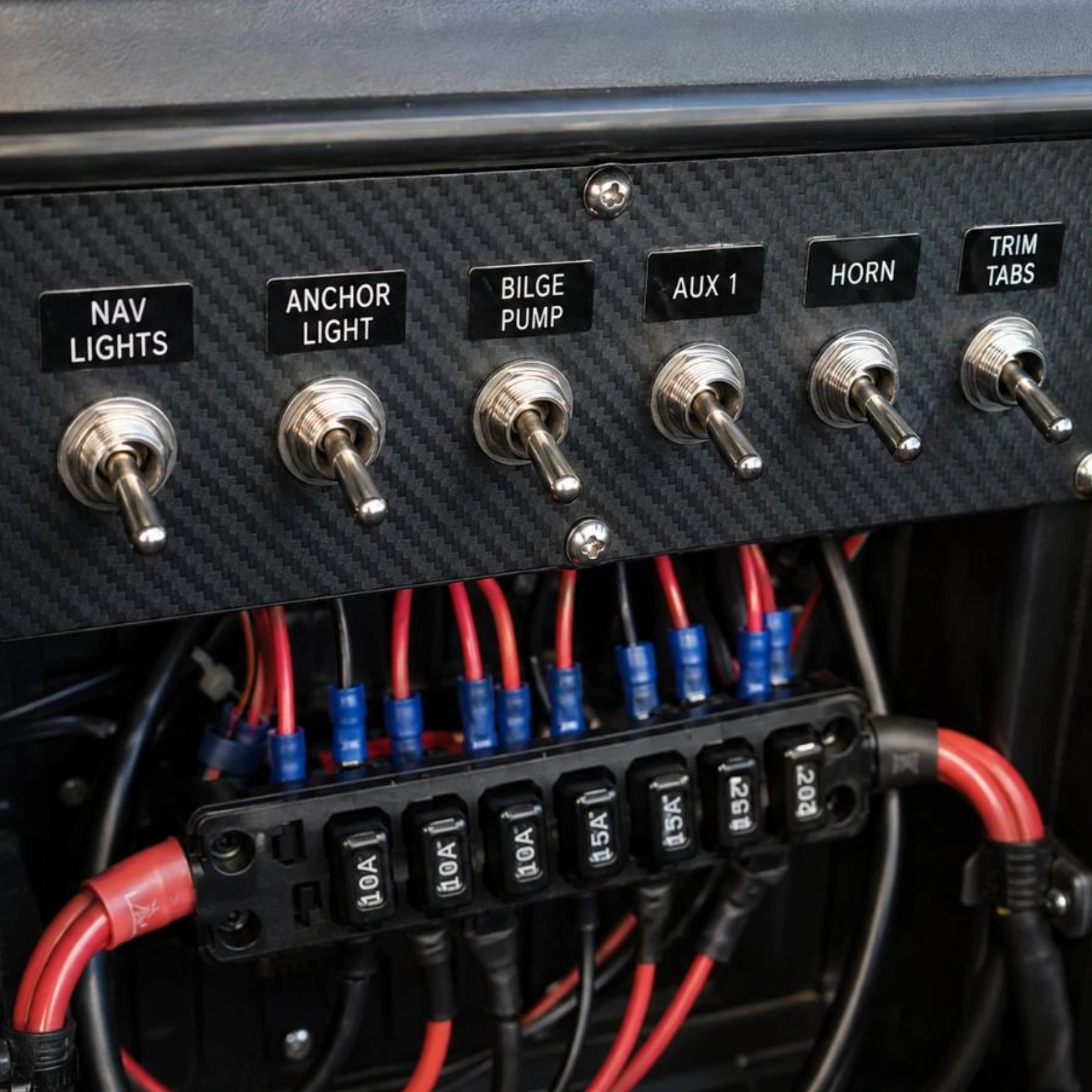 Toggle Switch TS-040 (KN3C-223) installed flush in boat dashboard panel wired to fuse holder