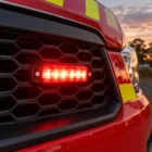 ECCO ED3801R red ultra thin LED directional light installed on a fire and rescue vehicle grille