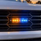 ECCO ED3802AB amber/blue ultra thin LED directional light in use on a emergency support vehicle grille