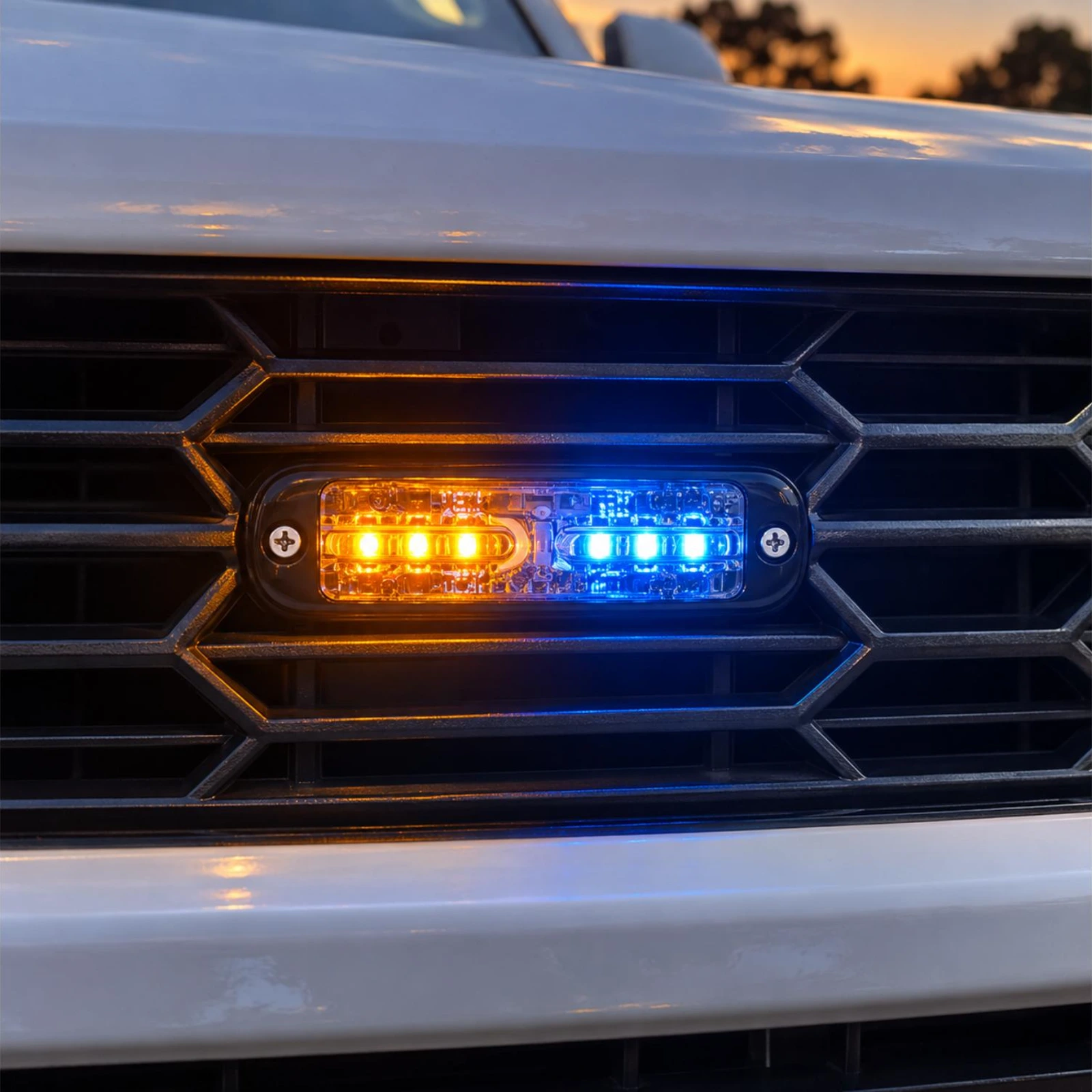 ECCO ED3802AB amber/blue ultra thin LED directional light in use on a emergency support vehicle grille