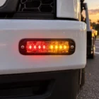 ECCO ED3802AR red/amber ultra thin LED directional light in use on a roadside assistance tow truck bumper