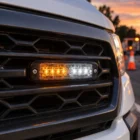 ECCO ED3802AW amber/white ultra thin LED directional light in use on a work ute grille at a roadside worksite