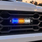 ECCO ED3802BAW blue/amber/white ultra thin LED directional light in use on a emergency services vehicle grille