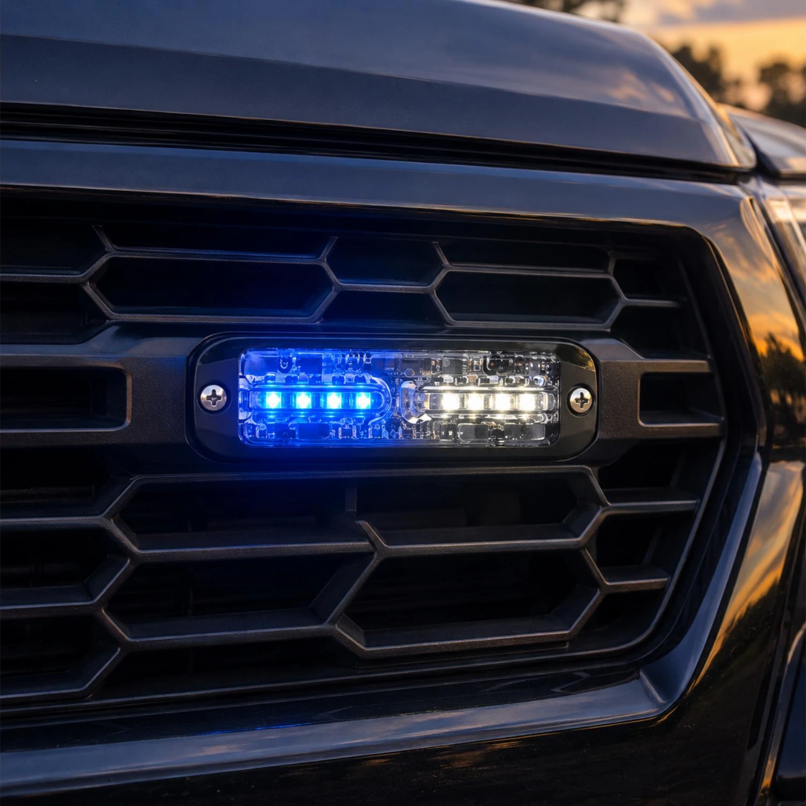 ECCO ED3802BW blue/white ultra thin LED directional light in use on a emergency response vehicle grille