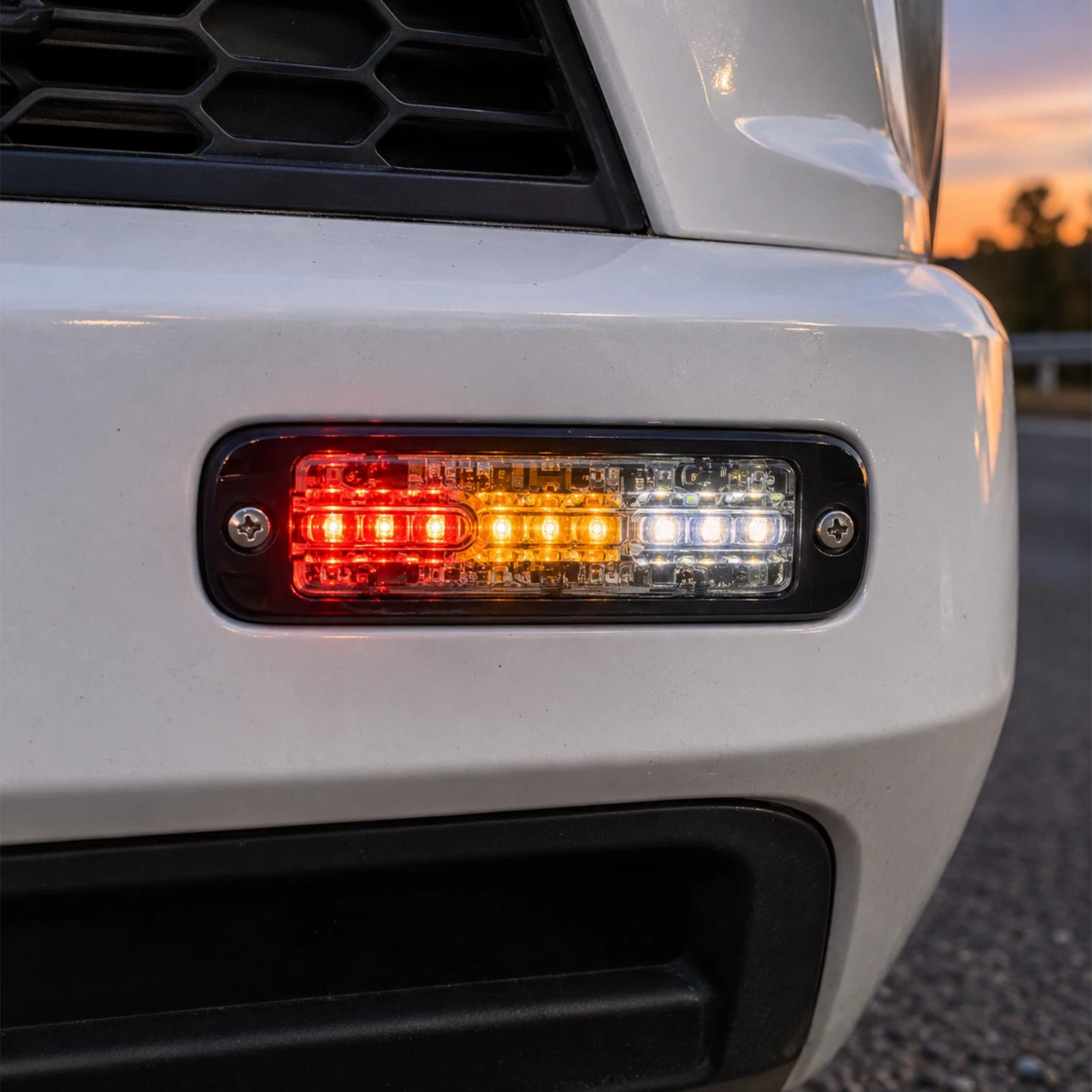 ECCO ED3802RAW red/amber/white ultra thin LED directional light in use on a roadside assistance vehicle