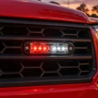 ECCO ED3802RW red/white ultra thin LED directional light in use on a fire and rescue vehicle grille