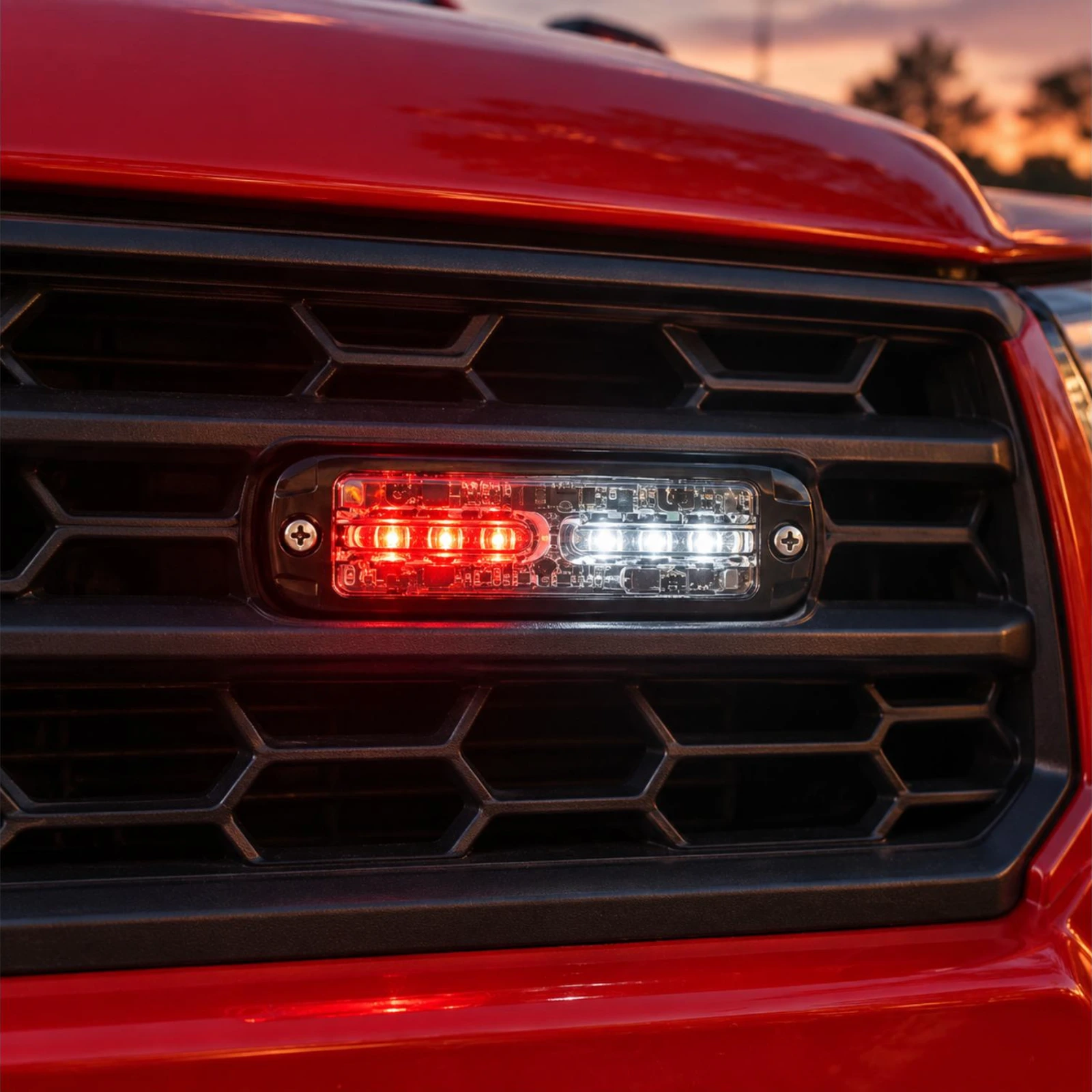 ECCO ED3802RW red/white ultra thin LED directional light in use on a fire and rescue vehicle grille
