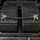 Pre-made battery joiner cable linking two batteries