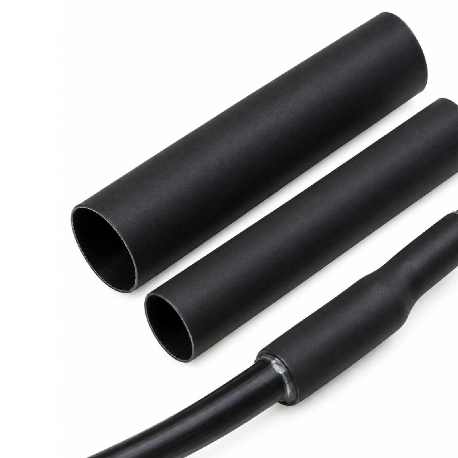 LV Automotive dual wall heat shrink black Black adhesive-lined dual wall heat shrink tubing, unshrunk and shrunk onto a cable