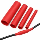 Red single wall heat shrink tubing in several sizes with one piece shrunk over a wire join