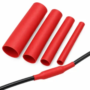 Red single wall heat shrink tubing in several sizes with one piece shrunk over a wire join