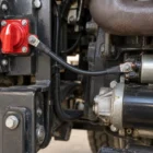 Pre-made starter switch cable linking a battery isolator switch to the starter solenoid